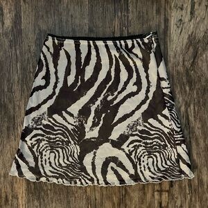 Princess Polly, animal print mini skirt, like new condition, Size 4